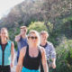 a group of people walking outdoors