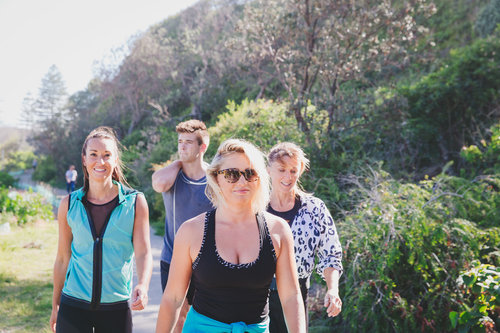download-1 a group of people walking outdoors