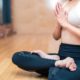a woman in doing a yoga pose