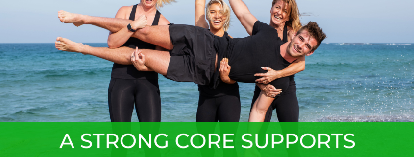 a banner of group of women carrying a man on their arms in front of a beach