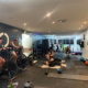 indoor fitness gym with group of people doing their fitness session